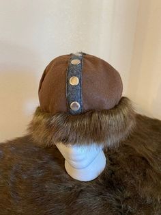 Unlined felt Viking/Medieval hat with faux fur around hat band and gray felt trim with silver metal detailing.  Hat band measures 23 inches around.  Please measure head circumference to ensure fit. Felt Viking Hat, Medieval Hats, Viking Medieval, Viking Hat, Costume Hats, Hat Band, Head Circumference, Costume Accessories, Headpiece