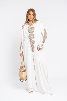 Feel like a bohemian queen in this Kaftan Maxi dress with its colorful embroidery. Dress it up with some heels or dress it down to run some errands and feel comfortable in your home. Extremely soft and flowy fabric perfect for all seasons.  Fabric: 70% Egyptian Cotton; 30% Polyester. Sizes : Small to XXL.  Kaftan measurements and model size in the last picture of the listing.  >> Shipping times<< We ship all orders with DHL or UPS Express within one to two business days. Delivery times to the US Embroidered Caftan, Cotton Caftan, Belle Silhouette, Colorful Embroidery, Summer Favorites, Caftan Dress, Egyptian Cotton, Style Expert, Look Plus