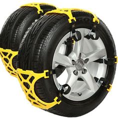 two tires with yellow chains attached to them