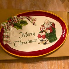 a merry christmas platter with santa clause on it