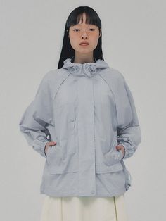 This is a modern and unique windbreaker jacket by ahwe that is made out of high quality and sturdy fabric. With minimal design detail and trendy mood, you can style it for your casual and refined daily outfit.- Adjustable string on the hoodie and hem- Raglan sleeves with pleats- Symbol embroidery on the pocket- Zipper and snaps closure Modern Long Sleeve Track Jacket For Spring, Oversized Techwear Windbreaker For Spring, Oversized Functional Windbreaker For Spring, Modern Hooded Raincoat For Spring, Oversized Functional Spring Windbreaker, Modern Long Sleeve Spring Windbreaker, Urban Windbreaker With Detachable Hood For Spring, Techwear Windbreaker With Detachable Hood For Spring, Gray Hooded Track Jacket For Spring