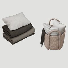 three different types of blankets and pillows on top of each other, one with a pillow