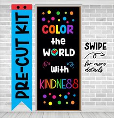 two colorful banners with the words, color the world and kindness on them against a brick wall