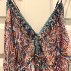 100% Polyester Maxi Dress V Neck Spaghetti Straps With Tassels Which Tie In Back Turquoise Woven Trim At Neckline Ptp 17”-19” (Stretched) Tiered Dress With Small Ruffle At Each Tier Upper Back Has Ruching Nwt Excellent Condition Beach Sundress With Paisley Print And V-neck, Bohemian Cami Dress With Floral Print, Spring V-neck Sundress With Paisley Print, Patterned V-neck Printed Sundress, Patterned Printed V-neck Sundress, Sleeveless Patterned Maxi Dress With Paisley Print, Sleeveless Patterned Paisley Print Maxi Dress, Patterned V-neck Summer Sundress, V-neck Beach Sundress With Paisley Print