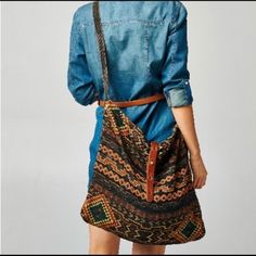 Woven Earth-Tone Crossbody Shoulder Bag With Belted Detail Closure 100% Cotton Made In India Bin 9 Casual Brown Shoulder Bag With Leather Handles, Bohemian Shoulder Bag With Large Capacity For On-the-go, Bohemian Crossbody Saddle Bag For Everyday Use, Casual Brown Saddle Bag For Everyday Use, Casual Brown Hobo Shoulder Bag, Bohemian Brown Satchel For On-the-go, Casual Brown Shoulder Bag With Adjustable Strap, Bohemian Bags With Adjustable Strap, Bohemian Saddle Shoulder Bag For Travel