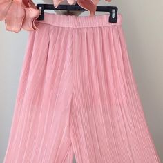 Extremely Pretty, Brand New With Tags Attached Super Wide / Multiple Mini Pleats/ Wide Leg Palazzo Style 'Pull On' Pants By Zara. These Beauties Have Attached Undershorts Underneath. Size Small. Can Fit A Medium Size Too Due To The Fact That It's An Elastic Waist. Excellent Condition! Please See All Pictures. Pink High Waist Pleated Bottoms, Spring Pleated Ankle Pants, Spring Pleated Ankle-length Pants, Pink Wide Leg Pants For Summer, Summer Pink Wide Leg Pants, Feminine Wide Leg Bottoms For Spring, Pink Wide-leg Pants For Summer, Summer Pleated Ankle-length Pants, Pink Stretch Wide Leg Pants For Summer