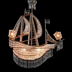 a chandelier that has a boat on it