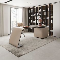 an office with a desk, chair and bookcase