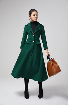 "This stunning dark green wool coat for womens is beautifully fitted and tailored for a classic, feminine design. There is a brooch decoration on lapels.The long wool coat features dark green, a slim fitting bodice with long sleeves and fitted waist leading into a long,flowing skirt coat. Details : * dark green wool blend fabric with polyester lining * two pockets * button closure in front * lapel collar * long sleeves * brooch decoration * winter coat, spring coat, womens coat * mid calf length Elegant Green Wool Outerwear, Elegant Green Outerwear For Office, Elegant Green Office Outerwear, Elegant Green Long Wool Coat, Elegant Green Wool Coat, Elegant Green Wool Coat For Winter, Elegant Green Wool Coat For Fall, Elegant Formal Green Outerwear, Elegant Green Formal Outerwear