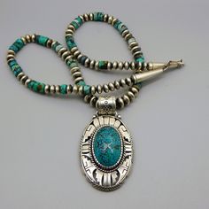 "Be noticeable with the jewelry you wear, buy unique Totally awesome.Handcrafted sterling silver and huge oval Hubei turquoise pendant on  24.0\" genuine Kingman and sterling beads necklace. Available at $684.00 ( retail is $1944.00 ), This necklace is 100.0 grams of pure love. Metal:Silver                                                                                   Metal Purity:.925 Hallmark:STERLING  This pendant is 24\" long.  Weight ( gram ):100.3 Condition:New" Luxury Unique Kingman Turquoise Necklaces, Luxury Traditional Silver Turquoise Necklace, Luxury Handmade Turquoise Necklace With Round Pendant, Hubei Turquoise, Antique Silver Rings, Artisan Necklace, Pure Love, Totally Awesome, Turquoise Pendant