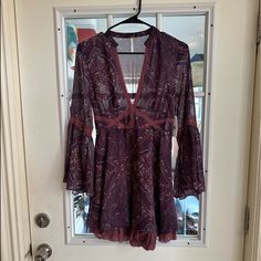 Free People Purple Paisley Mini Dress, Deep V Neck, Flare Sleeves Paisley Print V-neck Party Dress, Fall V-neck Mini Dress With Paisley Print, Fall Paisley Print V-neck Mini Dress, Casual Paisley Print Mini Dress For Party, Flowy Mini Dress With Paisley Print, Flowy Paisley Print Mini Dress, Bohemian Mini Dress With Paisley Print For Fall, Bohemian Paisley Print Mini Dress For Fall, Whimsical Goth