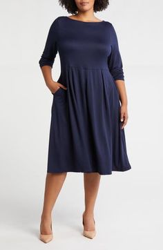 Soft, supple jersey feels as great as it looks on this long-sleeve midi dress cut in a versatile and chic fit-and-flare silhouette. 44 1/2" length Slips on over head Jewel neck Long sleeves 92% polyester, 8% spandex Machine wash, tumble dry Imported Casual Long Sleeve Midi Dress For Work, Casual Midi Dress With 3/4 Sleeves For Fall, Flattering Stretch Midi Dress With Long Sleeves, Modest Stretch Midi Dress For Fall, Flare Long Sleeve, Long Sleeve Jersey, Long Sleeve Midi, Jewel Neck, Long Sleeve Midi Dress