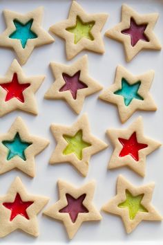 star shaped cookies are arranged on a plate