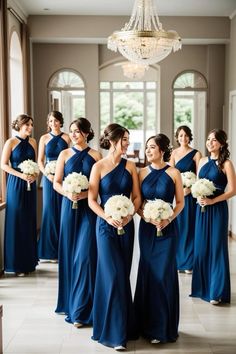 the bridesmaids are all dressed in blue