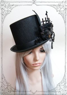 Elegant tophat for victorian ladies and gentlemen Gothic Winter Costume Hats And Headpieces, Gothic High Crown Costume Hat For Cosplay, Black Gothic Hat For Costume, Black Gothic Hat For Cosplay, Punk High Crown Top Hat For Cosplay, Punk Style Halloween Party Top Hat, Punk Top Hat For Halloween Party, High Crown Top Hat For Halloween Themed Events, Black Halloween Top Hat With Short Brim