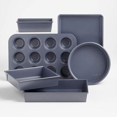 an assortment of baking pans and trays