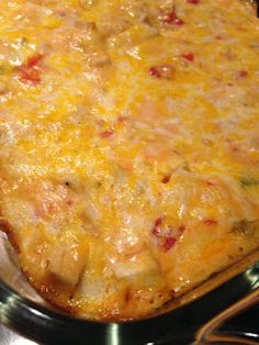 a casserole dish with meat and cheese in it