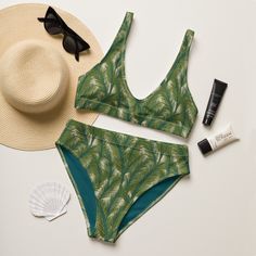 Perfect for the beach or laying by the pool, this olive green tropical high waisted bikini swimwear set features a painted brush stroke palm leaf pattern accented with a dark teal inner liner.  Designed in Cincinnati, Ohio, USA. Original artwork illustrated by Periwink Boutique. Made with a wink and a smile ;) This bikini is destined to become the only swimsuit you want to reach for in your drawer! The bottoms are high-waisted, and the top has removable pads. Both come with a tear-away care labe Tropical High Waist Tankini For Poolside, High Waist Tropical Print Swimwear For Poolside, Tropical High Waist Swimwear For Pool, High Waist Tropical Swimwear For Pool, Green Swimwear For Summer Poolside, Green Triangle Top Tankini For Vacation, Green Tropical Print Tankini For Sunbathing, Green Tropical Style Tankini For Swimming, Tropical Green Tankini For Swimming