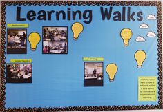 a blue bulletin board with yellow light bulbs and writing on it that says learning walks