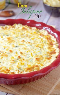 a casserole dish is sitting on a cutting board