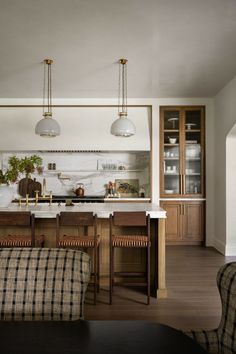 the kitchen is clean and ready to be used as a dining room or living room