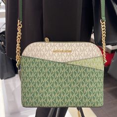 Michael Kors Jet Set Travel Medium Color-Block Signature Logo Dome Crossbody Bag Color Fern Green Multi Nwt Authentic This Crossbody Bag Boasts Signature Appeal In Logo-Print Canvas That’s Color-Blocked And Accented With Top-Stitch Detailing. The Structured Dome Shape Has A Polished Sensibility, Heightened By An Adjustable Chain-Trimmed Strap. You’ll Find The Back Slip Pocket Endlessly Convenient. Crossbody Bag Logo-Print Canvas 89.4% Coated Canvas/9.6% Polyester/1% Polyurethane Gold-Tone Hardwa Bag Logo, Coach Crossbody Purse, Brown Crossbody Bag, Exterior Details, Brown Leather Handbags, Fern Green, Brown Shoulder Bag, Michael Kors Crossbody, Black Leather Crossbody Bag