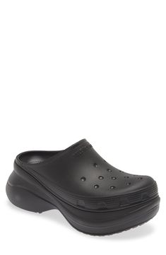 Rock your CROCS with your off-duty look in this water-resistant clog made in collaboration with Italian design house Balenciaga and set on a chunky curved sole. Synthetic upper, lining and sole Imported Men's Designer Shoes Modern Clogs With Round Toe For Streetwear, Functional Round Toe Clogs For Streetwear, Modern Round Toe Clogs For Streetwear, Casual Clogs With Textured Sole For Outdoor, Modern Slip-on Clogs For Streetwear, Modern Streetwear Clogs With Round Toe, Modern Synthetic Clogs For Outdoor, Modern Outdoor Clogs With Rubber Sole, Balenciaga Crocs