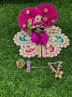 beautiful pink colour laddu Gopal poshak with heavy all over Pearl work Available for  Size 2 - dress diameter is 6 inches  Weight of dress is approx 60 gms Designer piece Quality guaranteed  From land of Krishna, Mathura Krishna dress with matching Pagdi , haar , Bansi ( flute) and kangan ( bangles) Pink Kundan Sets For Navratri, Pink Gota Work Sets For Celebration, Pink Sets With Gota Work For Festivals, Pink Festival Sets With Gota Work, Pink Kundan Traditional Wear For Diwali, Pink Sets With Latkans For Navratri, Pink Tilla Sets For Diwali, Pink Traditional Wear With Latkans For Puja, Diwali Pink Tilla Sets