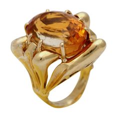 Very high style oval Citrine & 18kt Yellow Gold Architectonic Ring. Ultra chic & wild, Bears 750, 18Kt,Italy & Italian Assay mark "Al". Approximately size 6 Gold Ring Women 1stdibs, Cognac Sapphire Engagement Ring, Luxury Oval Yellow Gold Topaz Ring, Luxury Yellow Gold Oval Topaz Ring, Luxury Gold Topaz Ring With Polished Finish, Gold Oval Hallmarked Topaz Ring, Hallmarked Gold Oval Topaz Ring, Hallmarked Oval Gold Topaz Ring, Gold Oval Topaz Ring, Hallmarked