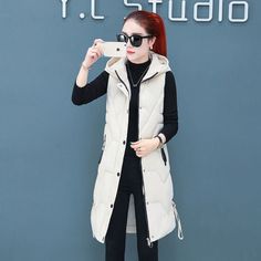 Season: Spring/AutumnPattern Type: SolidMaterial: PolyesterStyle: CasualOrigin: CN(Origin)Model Number: p8850Decoration: PleatedClothing Length: LongGender: WOMENAge: Ages 35-45 Years OldCollar: HoodedItem Type: Outerwear & CoatsClosure Type: zipperMain Stuffing: CottonOuterwear Type: Vest Hooded Solid Color Vest For Spring, Korean Shorts, Women Vest, Denim Decor, Dress Party Night, Cotton Vest, Vest Coat, Three Piece Suit, Padded Coat