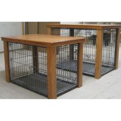 two wooden tables with metal cages on them