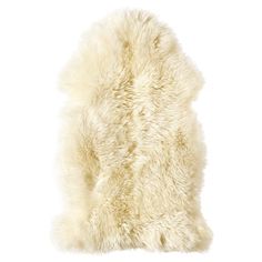 a white sheepskin rug on a white background