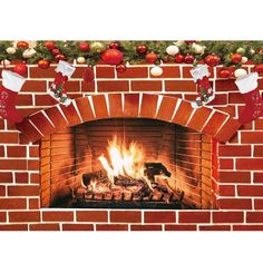 a brick fireplace decorated with stockings and christmas decorations