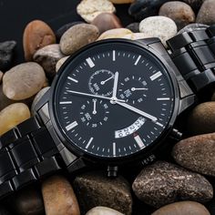 A personalized gift that can withstand constant use, this “Customized Black Chronograph Watch” is the perfect gift for all the special men in your life. From a thoughtful groomsmen gift, an anniversary memento, or a long-lasting keepsake for Father’s Day - to so much more. Featuring a three-eye decoration, calendar function, and luxury pointer in a waterproof and scratch-proof vessel. Personalize the back of the watch in Roboto font within 20 characters per line. Made from high-quality Stainless Engraved Watch, Personalized Watches, Watch Engraving, Anniversary Gifts For Husband, Groomsmen Gift, Watches Unique, Son Gift, Custom Watch, Watch Gifts