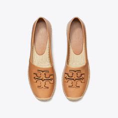 A timeless warm-weather shoe, crafted in soft leather. The Ines Espadrille features a double-stacked leather logo and a jute platform. Pair with jeans or a dress for a classic seasonal style. Designer Espadrilles, Footwear Design Women, Leather Logo, Seasonal Fashion, A Dress, Leather Working, Strap Sandals, Warm Weather, Women Empowerment