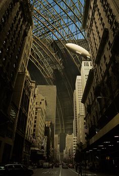 an image of the inside of a city with skyscrapers and people walking around it