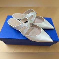 * Stuart Weitzman Satin Mules * White * Pointed-Toes * Size 5 New With Box And Bag. Only Tried On At Home Elegant Slip-on Wedding Shoes For Spring, Elegant Cream Low Heel Flats, Elegant Cream Flats For Party, Chic Flat Wedding Shoes, Elegant Closed Toe Party Flats, Chic Closed Toe Wedding Flats, Chic Wedding Flats With Closed Toe, Chic Wedding Flats Closed Toe, Chic Almond Toe Wedding Flats