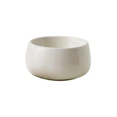 a white bowl sitting on top of a table