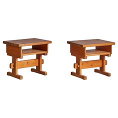 two small wooden tables sitting next to each other on top of a white background,