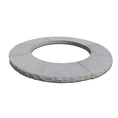 a circular stone fire pit on a white background