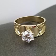 Beautiful engagement ring in 14k gold with a diamond cut zirconia stone design. Ring size is adjustable, please note the size in the personalizing section of checkout. The ring is 1 mm thick. Beautiful Engagement Ring, Beautiful Engagement Rings, White Band, Stone Design, Diamond Cut, Wedding Engagement, Heart Ring, Diamond Cuts, Engagement Ring