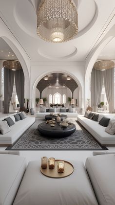 a living room filled with lots of white furniture