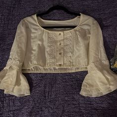 Never Worn!! Perfect Condition. From A Vintage Store In Paris, No Brand Name. White/ Beige Color. Super Cropped 4 Button Detailing On Front 3/4 Long Bell Sleeves Size Xs/S White Beige Color, Vintage Coquette, Long Bell Sleeves, Vintage Store, White Beige, No Brand, Beige Color, Cream White, Bell Sleeves