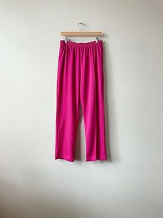 ~* ALL ITEMS ARE UNIQUE VINTAGE PIECES *~ ITEM DESCRIPTION: This pair of 80s/90s era hot pink high waist straight leg pants are super adorable and completely versatile. Easily dressed up or down depending on the occasion. Material is 100% Polyester, it has working pockets, and the waist is elastic. Garment has been gently worn and is still in excellent condition. SIZE: Medium  MEASUREMENTS: (All measurements are taken while the garment is laying flat. Please note that vintage sizing is not alway 90s Era, Vintage Pieces, Straight Leg Pants, Unique Vintage, Leg Pants, Hot Pink, Gender Neutral, High Waist, Straight Leg