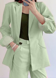 This oversized single breasted blazer is the perfect blend of feminine glamour and Androgynous power dressing. The bold padded shoulders hold the boxey shape with a twist of open back aesthetic, hung on an overtly decadent, knotted rope embellished trim. The blazer is constructed of a loosely woven suiting fabric for a slightly softly tailored fluidity and can be worn as a blazer or dress.Size Chart : Back Aesthetic, Knotted Rope, Single Breasted Blazer, Glamorous Party, Suiting Fabric, Single Button Blazer, Green Blazer, Power Dressing, Suit Fabric