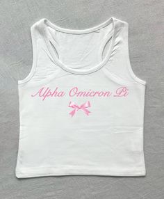 a white tank top with pink ribbon and the words apha onion di on it