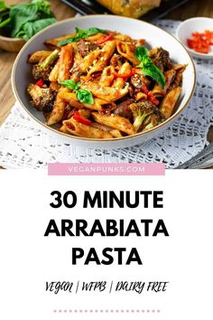 A pinterest image showing a bowl of pasta in the top half of the image with title text on a white background beneath it. Arrabiata Pasta, Spicy Pasta Sauce, Pasta Arrabiata, Accidentally Vegan, Spicy Pasta, Vegan Parmesan Cheese