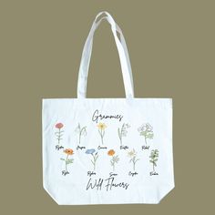 Give the perfect gift with this "Personalized Watercolor Birth Month Flower" Tote Bag! This unique and charming tote bag is perfect for carrying all of your daily essentials, while showcasing the birth month of your loved ones! Personalize your tote bag by selecting the birth month flower that corresponds with your birthday. Want this design on a Tumbler? Check out this listing! Personalized Green Bags For Daily Use, Eco-friendly Flower-shaped Everyday Bag, Everyday Personalized Multicolor Bags, Personalized Multicolor Bags For Everyday, Multicolor Personalized Bags For Everyday Use, Botanical Flower Shaped Bags For Daily Use, Botanical Flower-shaped Bags For Daily Use, Botanical Flower-shaped Bag For Daily Use, White Botanical Rectangular Bag