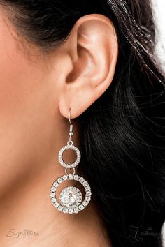 Dozens of circular silver frames are encrusted in shimmery white rhinestones and link together to create a dizzying display along the collar. The frames gradually increase in size as they lead to the center, boldly showcasing their stunning detail. Solitaire white rhinestones, wrapped in a border of dainty sparkling accents, are sporadically sprinkled throughout the lacy canvas, with square-cut rhinestones in pronged settings adding three-dimensional dazzle. Features an adjustable clasp closure. Brown Bracelet, Bling Necklace, Silver Frames, Paparazzi Accessories, White Necklace, White Rhinestone, Colourful Necklace, Paparazzi Jewelry, Square Cut