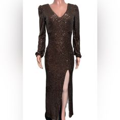 Make A Statement At Your Special Occasion With This Stunning Brown Sequin Evening Gown By Xscape. Featuring A Sweetheart Neckline And Long Sleeves, This Ball Gown Dress Has A Flattering A-Line Silhouette And Elegant Front Split. The Dress Is Made From A Blend Of Polyester Materials And Has A Convenient Zip Closure For Easy Wear. Perfect For A Party, Cocktail Event, Or Wedding Party, This Dress Is Sure To Turn Heads. The Brown Sequin Accents Will Add A Touch Of Glamour To Your Look And The Dress Sequence Gown, Orange Satin Dress, Sherri Hill Gowns, Blue Sparkly Dress, Gown Bridesmaid, Ball Gown Dress, Beautiful White Dresses, Sequin Evening Gowns, White Strapless Dress